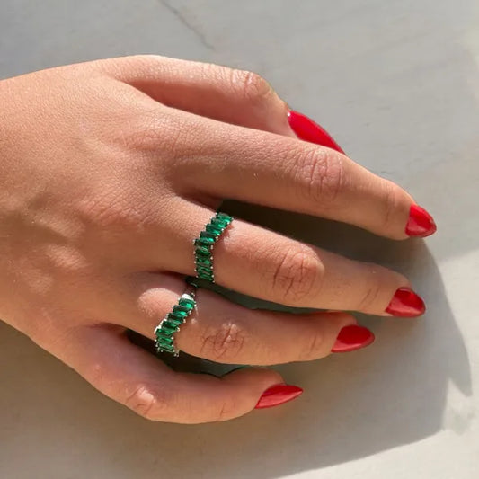 changing dirction green silver ring